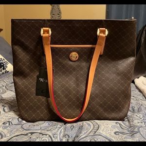 New with tags. Large Rioni leather tote.